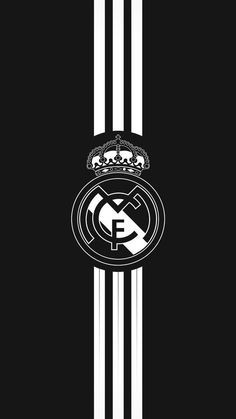 the real madrid logo on black and white stripes