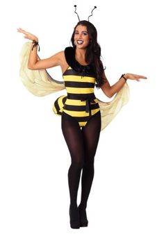 a woman dressed in a bee costume posing for the camera with her arms outstretched and legs spread out