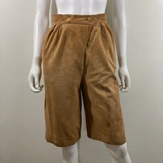 Vintage 1990's Brown Chamois Suede Shorts, Stanley Blacker, High waist, Knee Length Shorts- with pockets  Made in Hungary Good Vintage Condition Size 6 Length 24 inches  Waist 13.5 inches across  Inseam 12 inches  Rise 13 inches  *some wear on one leg- see photos Raca Rara Vintage Collections  *supporting a circular system for a healthy planet  *please ask all questions prior to purchase  *all sales are final Soft Chamois, Vintage Collections, Suede Shorts, Lafayette La, Knee Length Shorts, Shorts With Pockets, Hungary, Short Outfits, Vintage Collection