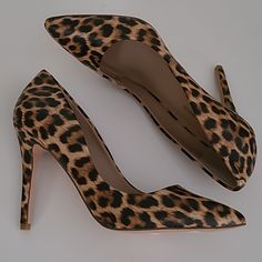 Take A Walk On The Wild Side With These Gorgeous Head Turning Neiman Marcus Leopard Print High Heel Stilettos They Do Have The Slightest Texturing To The Faux Leather. Animal Print Will Never Go Out Of Style, And Add That Perfect Neutral Pop To Your Most Basic Neutrals, Be It Jeans, Dresses, Suits, Or Jumpsuits - It Doesn't Matter. These Go With Everything!!! All Manmade Material Neiman Tag Still On Bottom Brand New No Box - Never Worn Leopard Print Heels With 4-inch Pointed Toe, Elegant Ankle Strap Heels In Leopard Print, Elegant Leopard Print Ankle Strap Heels, Formal Leopard Print Heels With Ankle Strap, Elegant Fitted Leopard Print Heels, Leopard Print Pointed Toe Heels For Work, Leopard Print Heels With Pointed Toe For Workwear, Chic Leopard Print Heels With Pointed Toe, Leopard Print Leather Heels For Workwear