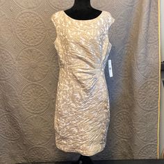 Ralph Lauren Sleeveless Party Dress. Brand New With Tags. Cream Colored Dress With Gold/Taupe Flowered Appliqu, Cap Sleeves And Roughing At Waist For A Slimming Look. Pit To Pit Measures Approximately 19.5” Waist Measures Approximately 17.5” Front Collar To Hem Measures Approximately 35.5” Hemline Measures Approximately 19.75” The Widest Part Of The Hips Measures Approximately 19.75” Elegant Fitted Sleeveless Holiday Dress, Elegant Beige Sleeveless Dress For Party, Elegant Beige Sleeveless Party Dress, Beige Sleeveless Dress For Spring Party, Beige Lined Party Dress, Champagne Sleeveless Summer Dress, Champagne Sleeveless Dress For Summer, Sleeveless Champagne Dress For Summer, Summer Sleeveless Champagne Dress