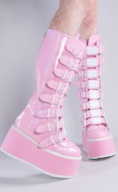 Show off yer pastels! The DAMNED-318 boots are sugar-sweet knee highs that feature 8 plated straps and white trims for an eye-catching effect. Slip in n' out in a snap with full-length rear zips. The DAMNED series features a 3 1/2 inch flatform. Material: 100% vegan PU leather. US women's sizing-refer to size chart for more info. Pink And White High Boots, White And Pink Clothes, Pastel Platform Boots, Cute Platform Shoes, Holographic Boots, Pink Platform Boots, Pink Platform Shoes, Platform Knee High Boots, Pink Looks