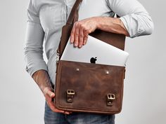 Personalized leather briefcase is a stylish, professional way to carry your stuff. A day-to-day bag suitable between the home, office, and the odd overnight excursion. Function and finesse, all in one. Shoulder strap of this laptop bag is detachable and can be adjusted at the most suitable length. Handle on top makes it even more comfortable to carry. This handcrafted briefcase make excellent gifts for various occasions, including but not limited to your boyfriend, husband, groomsmen, best man, Modern Briefcase For Everyday Carry, Luxury Briefcase For Daily Use, Classic Everyday Briefcase Shoulder Bag, Classic Everyday Carry Shoulder Briefcase, Rectangular Satchel With Laptop Sleeve For Everyday, Rectangular Briefcase With Laptop Sleeve, Everyday Carry Rectangular Satchel With Laptop Sleeve, Leather Office Bags, Messenger Bag For Men