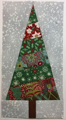 a christmas tree made out of scrap paper