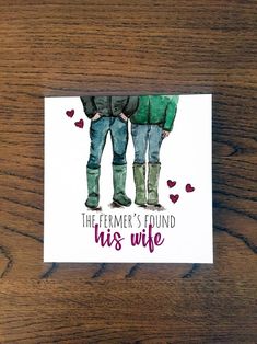 the farmer's found his wife greeting card on a wooden table with red hearts