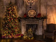 a living room with a christmas tree and fireplace