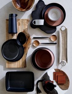 a table topped with lots of different types of dishes