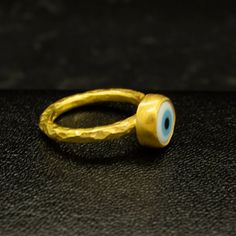 Blue Evil Eye Ring | Protection Gold Hammered Ring | 925 Sterling Silver Ring 24K Gold Plated | Good Luck Ring | Dainty Gift Handcrafted hammered  Silver RingOur shop offer free ring sizing and color options.(Oxidized(Black),Gold Plated)Metal : 925 Sterling SilverGemstone : Evil EyeBand Size : 2 mmRing Weight : 3.3 gramsRing Size : US 6 (The size you want is made for free).(We used the US standard sizing) **Custom Orders is Made**As pellada family, we will be happy to help you if you contact us Blue Evil Eye Ring, Eye Band, Hammered Jewelry, Green Emerald Ring, Hammered Silver Ring, Hammered Ring, Hammered Rings, Evil Eye Ring, Coin Ring