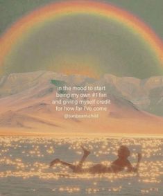 a person floating in the water with a rainbow above them and a quote on it