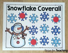 a snowflake coverall is shown on a table