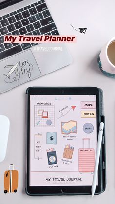 a table with a laptop, pen and notebook on it next to a cup of coffee