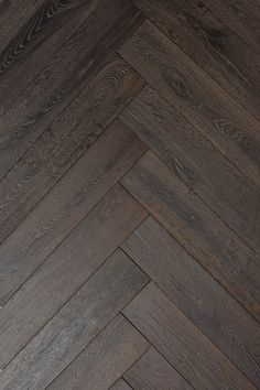 an image of wood flooring that looks like herringbones