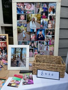 a table topped with pictures and photos next to a basket