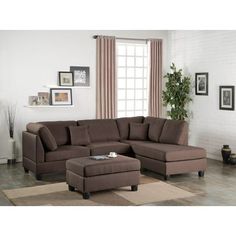 a living room with a sectional couch and ottoman