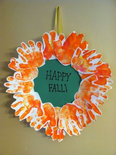 a paper wreath with the words happy fall written on it