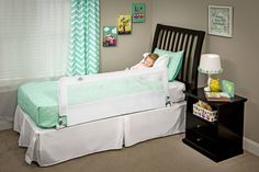 If you would label your toddler as a “wild sleeper”, give the Regalo HideAway Extra Long Bed Rail a try. It is an ideal solution for children who need a little extra protection from rolling out of bed. The all-steel bed rails measure 20” high so they can easily accommodate thick mattresses and extend an impressive 54” to provide the utmost coverage of the bed. Bed rails for toddlers can be an eye sore, so we’ve implemented our patented Glide Trac System. It allows the rail to tuck under the matt Safety Bed, Bed Rails For Toddlers, Rail Guard, Bed Rail, Long Bed, Steel Bed, Toddler Beds, Queen Mattress Size, King Size Mattress