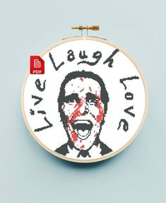 a cross stitch pattern with the image of a man's face and words on it