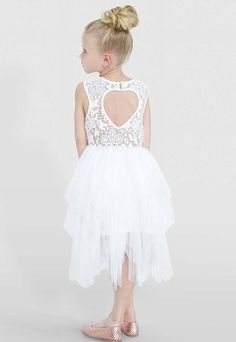 The drop-dead gorgeous Tara Heart Back Dress features soft floral lace bodice, several layers of flowing tiered tulle and a beautiful and unique heart back cut out on the back. The perfect dress for your princess's next wedding, birthday party or special occasion! Material: 100% Cotton Lace & Lining, 100% Polyester Skirt  Sizes 10 & 12 Quality Dresses, Soft Floral, Lace Bodice, Girls Dream, Beautiful Heart, Back Dress, Cotton Lace, Girls Shopping, Wedding Designs