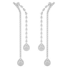 Total Carat Weight: These dazzling dangling earrings from the Moonlight Collection feature a total carat weight of 4.72 carats, showcasing the brilliance of meticulously selected diamonds in a stunning teardrop design. Diamonds: The earrings are adorned with high-quality diamonds, each handpicked for its exceptional clarity and sparkle. The diamonds are expertly set in a prong setting to enhance their brilliance, creating a mesmerizing effect with every movement. Design: The teardrop design adds a touch of elegance and sophistication, making these earrings a standout piece in any jewelry collection. The dangling style ensures that the diamonds catch and reflect light beautifully, adding a sense of luxury and glamour to any outfit. Setting: Crafted from luxurious 18k white gold, the setting Long Gold Earrings, Teardrop Dangle Earrings, Nature Inspired Design, Diamond Flower, Elegant Accessories, Modern Earrings, Quality Diamonds, Modern Jewelry, Long Earrings