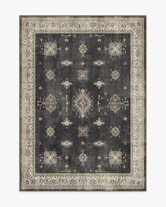 an area rug with various designs and colors on the carpet, including greys, beiges, and browns