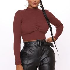 Ribbed Size Medium Chocolate Colored Long Sleeve Crop Top. Durable Fabric. **New With Tag!! Details Cropped Sweater Top High Neck Cinch Chest Detail Long Sleeve Ribbed Stretch Viscose/Nylon *Bundle & Save* *Make Me A Reasonable Offer* Items Listed Are On Other Sites To Be Sold. Don't Wait To Buy! :) *Smoke & Pet Free Home *The Color May Appear Different In Person. Brown Long Sleeve Top With Ruched Detail, Long Sleeve Brown Top With Ruched Detail, Fall Ribbed Crop Top For Night Out, Trendy Long Sleeve Ruched Crop Top, Chic Ruched Crop Top For Fall, Ruched Stretch Crop Top For Fall, Stretch Ruched Crop Top For Fall, Fall Stretch Ruched Crop Top, Chic Brown Crop Top For Fall