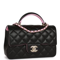 This Mini Rectangular flap bag is in Black lambskin with light gold tone hardware and has a front flap with signature CC turnlock closure, rear half moon pocket, black and light pink top handle and single interwoven light pink leather and light gold tone chain link shoulder/crossbody strap. The interior is lined in light pink leather and features a zipper pocket with Chanel pull and an open pocket below. Collection: 23P Origin: France Condition: Pristine; new or never Accompanied by: Chanel box, Chanel dustbag, carebook and ribbon Measurements: 8" width x 5" height x 2.5" depth; 1.77" top handle, 20" strap drop Chanel Mini Rectangular, Light Pink Top, Dream Bag, Light Pink Tops, Chanel Box, Chanel Mini, Bag Collection, Handbag Wallet, Wallet Accessories