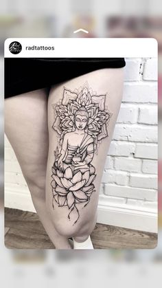 a woman's thigh with a buddha tattoo on it