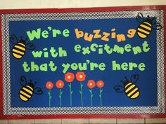 a sign that says, we're buzzing with excitement that you're here