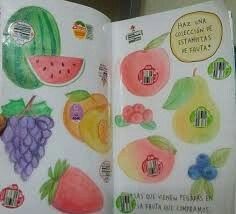 an open children's book with pictures of fruits and vegetables