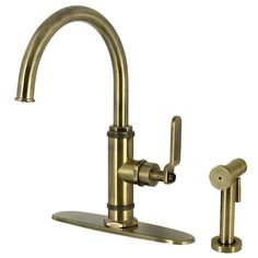 an antique brass faucet with two handles