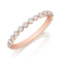 a rose gold wedding band with diamonds