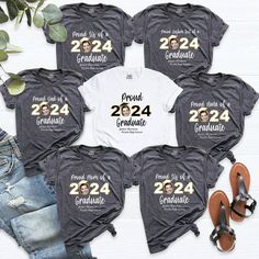 Proud Of A 2024 Graduation Shirt, Custom Family Shirts, Personalized Graduation Shirts, Class Of Senior Tee, Add The Photo Graduation Shirt. HI! Welcome to my store, I'm delighted to see you here. My store's main goal is to provide you with premium everyday apparel with the best graphic t-shirts. I see you as a friend, not just a customer. I'm sure you'll love my designs. You can order the same design 4XL and 5XL large sizes from the link, please specify the details in the order note.   https:// Cotton Crew Neck Top For Graduation, Relaxed Fit Crew Neck Top For Graduation, Custom Print Cotton Tops For Graduation, Casual Short Sleeve Tops For Graduation, Cotton Graphic Print Shirt For Graduation, Graphic Tee Crew Neck For Graduation, Short Sleeve Shirt With Text Print For Graduation, Graphic Tee Tops With Graphic Print For Graduation, Graduation Shirts For Family