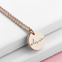 Our luxury personalised disc necklace is a beautiful yet simple piece of jewellery for her that she'll love wearing every day. It will perfectly compliment any outfit and is sure to wow her friends with its effortless beauty and quality craftsmanship. It features a cute little disc that you can personalise with a name or initial - this will be written in a lower case script font as standard. Your personalisation will be meticulously engraved by our dedicated team of creative specialists creating a unique, premium quality gift that she’s sure to cherish forever. The necklaces are available in 18ct gold plating, sterling silver plating and 18ct rose gold plating on brass, perfect to match for any occasion, making the necklace a significantly sentimental gift for her.A perfect gift to celebra