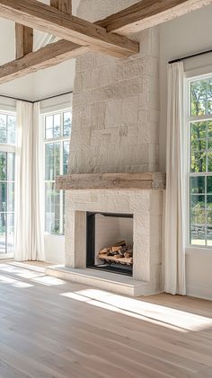 A beautifully designed farmhouse fireplace enhancing a cozy living room atmosphere. How To Stone A Fireplace, Stucco Fireplaces Indoor, Fireplace Between Doors, Accent Wall With Stone Fireplace, Floor To Ceiling Stone Fireplace Ideas, Mcgee And Co Fireplace Design, Stone Fireplace Living Room Decor, Travertine Fireplace Ideas, Colorful Southern Living Room