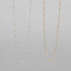 The next level in layering chains. Patterned mixed long and short links that add subtle dimension accenting your unique style. Delicate yet durable, this necklace is sure to become an everyday go-to. Available in 14k gold filled or sterling silver quality metals. Long links are approximately 2 x 5mm with a polished, smooth finish. Available in 16 or 18 inch lengths with a secure spring ring clasps. Every Jewel Ya design arrives in our acrylic containers for clean and safe storage. Contact us for Minimalist Figaro Chain Necklaces With Oval Link, Minimalist Figaro Chain Necklace With Oval Links, Minimalist Necklaces With Figaro Chain And Oval Link, Classic Everyday Satellite Chain Necklace, 14k Gold Filled Figaro Link Chain Necklace, Dainty Figaro Chain Necklace For Everyday, Delicate Everyday Figaro Chain Necklace, Everyday Figaro Chain Necklace With Rectangular Links, Everyday Delicate Figaro Chain Necklace