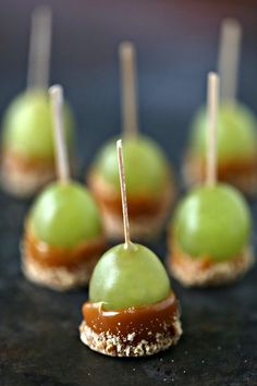 small desserts with green and brown toppings on top of each other, ready to be eaten