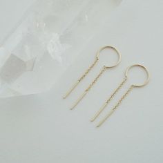 Threader earrings detailed with slim bar at each end. A fun, modern silhouette. Wear these stunners solo or alongside your favorite studs. 2.5" long chain drop measures 1". Made In: China Delicate Gold Jewelry, Gold Bar Earrings, Between Us, Earrings In Gold, Delicate Jewelry, Threader Earrings, Silver Bars, Bar Earrings, Stunning Earrings