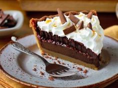 a slice of chocolate pie with whipped cream on top