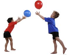 two young boys are playing with balloons on a white background and one boy is reaching for the balloon