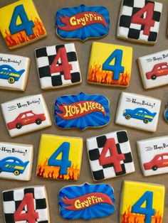 decorated cookies with cars and numbers on them