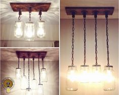 four mason jar chandelier lights hanging from the ceiling