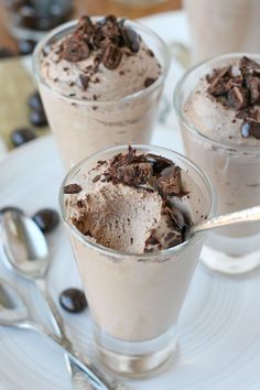 two dessert cups with ice cream and chocolate chips