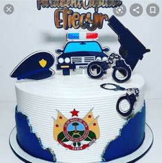 a police cake is decorated with various items