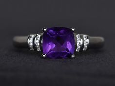 Welcome to my shop, you can find many beautiful gemstone jewelry here, and you also can ask for customized service.Main Stone: natural amethyst, cushion cut 7X7mm,1.49 carats.Accent Stones: czMetal: 925 sterling silver plated with rhodium. I also can provide metal options such as 14k solid yellow/white/rose goldSetting: four claw basket settingmore rings: https://www.etsy.com/shop/XCjewelryStudio?ref=hdr_shop_menuIt's quite comfortable for wearing and suitable for all occasions (wedding, anniver Amethyst Ring Vintage Silver, Fine Jewelry Purple Cushion Cut Amethyst Ring, Fine Jewelry Cushion Cut Amethyst Ring, Fine Jewelry Amethyst Cushion Cut Ring, Cushion Cut Purple Amethyst Ring, Amethyst Cushion Cut Ring For Gift, Amethyst Rings Cushion Cut For Gift, Amethyst Rings For Gifts, Cushion Cut, Cushion Cut Amethyst Rings For Gifts