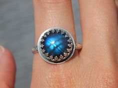 The Doria Ring features a stunning labradorite that glows blue like Dory from Finding Nemo! The intricate sterling silver setting paired with this unique stone make it a future heirloom! I hope you enjoy this piece for many years to come! Details: Size 10 (can be sized up to 11. Just let me know with a note at checkout! Intricate sterling silver setting with gorgeous floral band High quality round labradorite This item will be shipped within 5 business days. Each piece is handmade by me in my st Dory From Finding Nemo, Dory Finding Nemo, Finding Nemo, Metal Work, Size 10 Rings, Turquoise Ring, Labradorite, Ring Size, Let Me