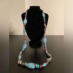 Macy’s Beaded Necklace With Turquoise, Red, And Silver Colored Beads I Have Lots Of Jewelry Listed, So Feel Free To Create A Bundle And Pay Only A $7.67 Flat Rate (For Up To 5 Lbs), Plus Take Advantage Of Bundle Pricing! Reasonable Offers Are Also Welcome. If You Like (Click Heart Sign On) Multiple Items, I Will Make Them Into A Bundle For You And Offer A Discount. New To Poshmark? Use This Link (Https://Posh.Mk/Vrvp72vgzab) Or The Referral Code (Me_and_mommy) To Save $10 On Your First Purchase. Blue Gemstone Beads For Festival, Blue Gemstone Beads For Festivals, Blue Gemstone Festival Beads, Blue Polished Bohemian Beads, Bohemian Blue Polished Beads, Bohemian Large Blue Beads, Bohemian Blue Gemstone Beaded Necklaces, Blue Bohemian Beaded Gemstone Necklace, Bohemian Blue Gemstone Beaded Necklace