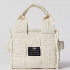 Soft Corduroy Mini Tote Bag One Size Brand New, With Tag Urban Outfitters Mini Tote Bag In Soft Corduroy. Boxy Silhouette With An Easy-Access Zip Top With Soft Carry Handles. 100% Cotton Removable Adjustable Strap Dimensions: 9” L X 6.5” H Offers Welcome Bundle To Save Have A Great Day!! White Cotton Shoulder Bag For On-the-go, White Cotton Shoulder Bag For Errands, Casual Rectangular Bag By Urban Outfitters, Casual Everyday Bags From Urban Outfitters, Trendy Urban Outfitters Tote Bag, Urban Outfitters Casual Rectangular Bag, Urban Outfitters Tote Shoulder Bag For Daily Use, Urban Outfitters Rectangular Bag For Daily Use, Urban Outfitters Rectangular Everyday Shoulder Bag