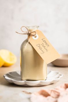 Lemon tahini dressing in a glass bottle with a label saying "lemon tahini dressing". Lemon Honey Tahini, Dairy Free Dressing Recipes, Roasted Veg Salad, Veg Salads, Healthy Whole Food Recipes, Dairy Free Salad Dressing, Dairy Free Dressing, Tahini Dressing Recipe