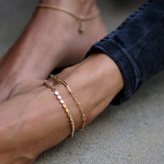 One of our favorite sexy, barefoot living accessories. 14K Gold Filled Chain. Length: 10" (adjustable) Reiki infused by Mara. Elegant Adjustable Tarnish-resistant Anklets, Minimalist Gold Chain Anklets, Chic Anklets With Adjustable Chain, Chic Adjustable Anklets With Adjustable Chain, Elegant Adjustable Chain Anklets, Elegant Adjustable Tarnish Resistant Anklets, Minimalist Chain Anklets, Yellow Gold Delicate Chain Anklet, Delicate Chain Yellow Gold Anklet