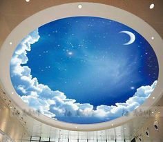 the ceiling is decorated with an image of clouds and a crescent in the sky above it